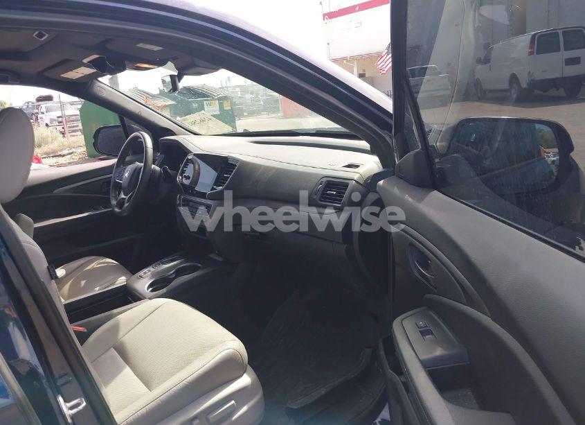 Photo 5 of 2023 Honda Passport AWD EX-L (VIN 5FNYF8H50PB007445)