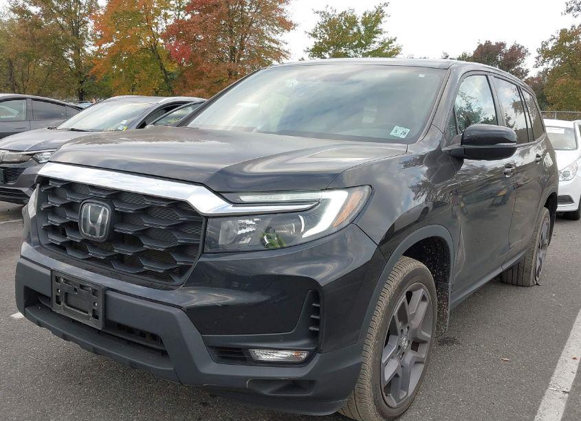 Photo 2 of 2023 Honda Passport AWD EX-L (VIN 5FNYF8H51PB021094)