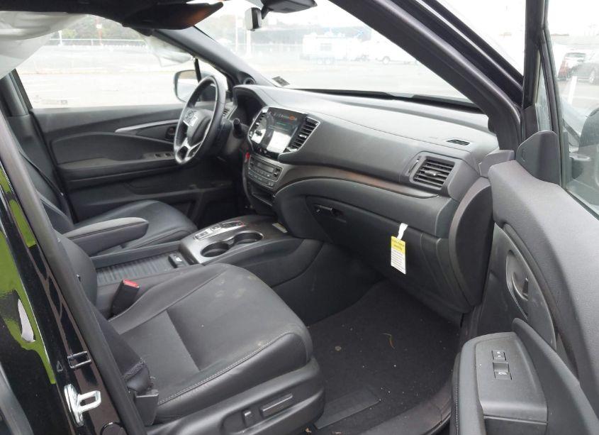 Photo 5 of 2023 Honda Passport AWD EX-L (VIN 5FNYF8H51PB021094)