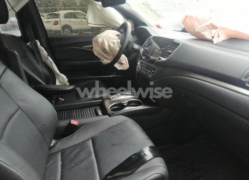 Photo 5 of 2023 Honda Passport AWD EX-L (VIN 5FNYF8H51PB039076)