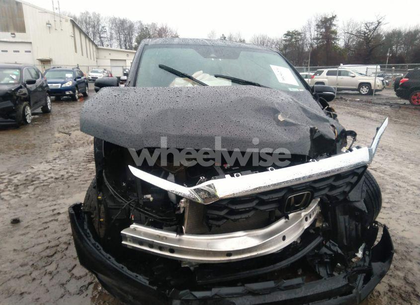 Photo 6 of 2023 Honda Passport AWD EX-L (VIN 5FNYF8H51PB039076)