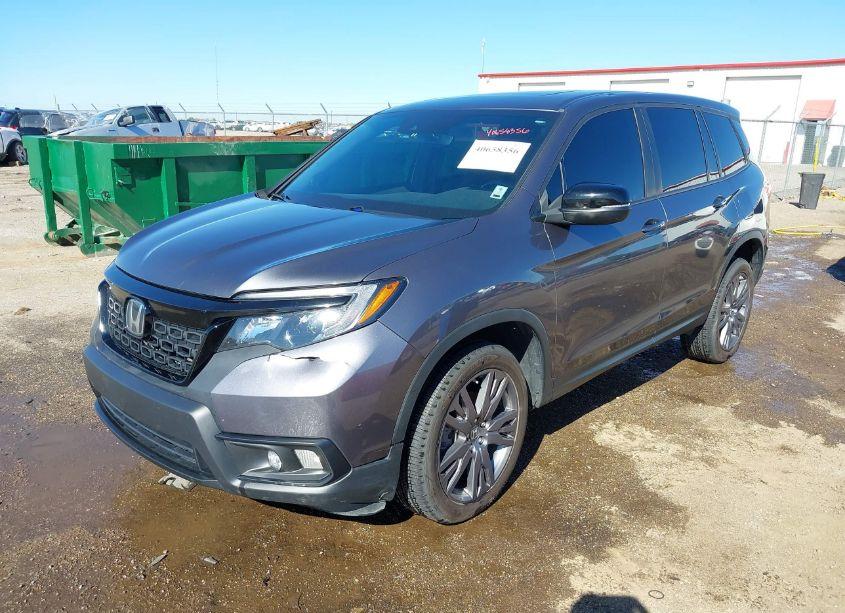 Photo 2 of 2021 Honda Passport AWD EX-L (VIN 5FNYF8H54MB018380)