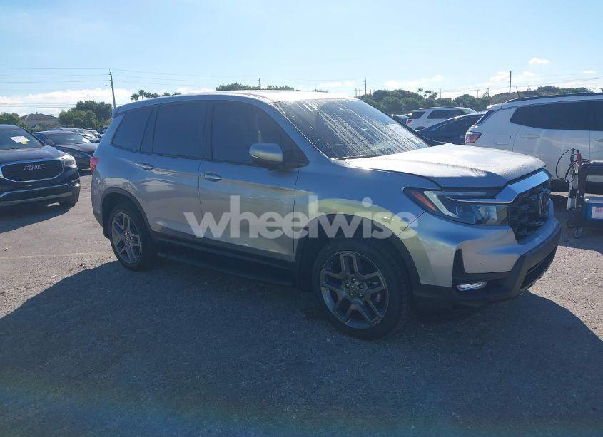 2023 Honda Passport AWD EX-L (VIN 5FNYF8H54PB012759) main photo
