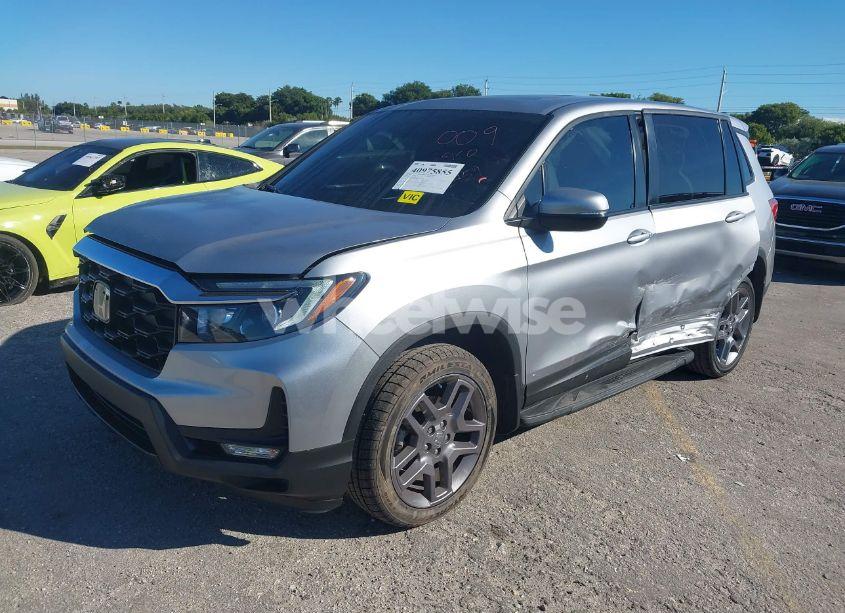 Photo 2 of 2023 Honda Passport AWD EX-L (VIN 5FNYF8H54PB012759)