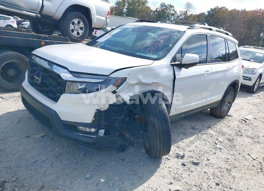 Photo 2 of 2023 Honda Passport AWD EX-L (VIN 5FNYF8H55PB024290)