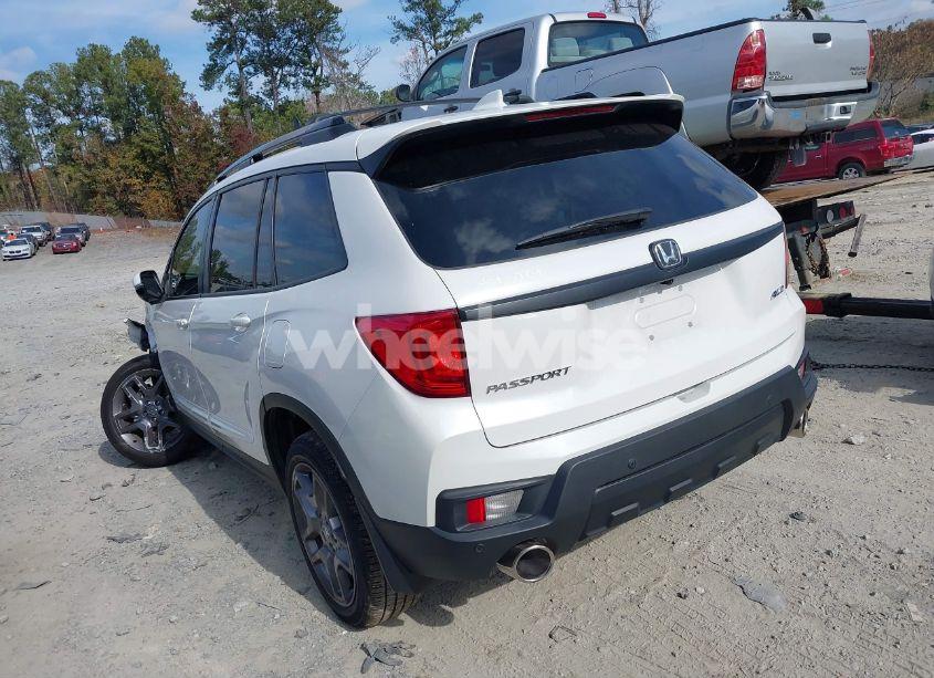 Photo 3 of 2023 Honda Passport AWD EX-L (VIN 5FNYF8H55PB024290)