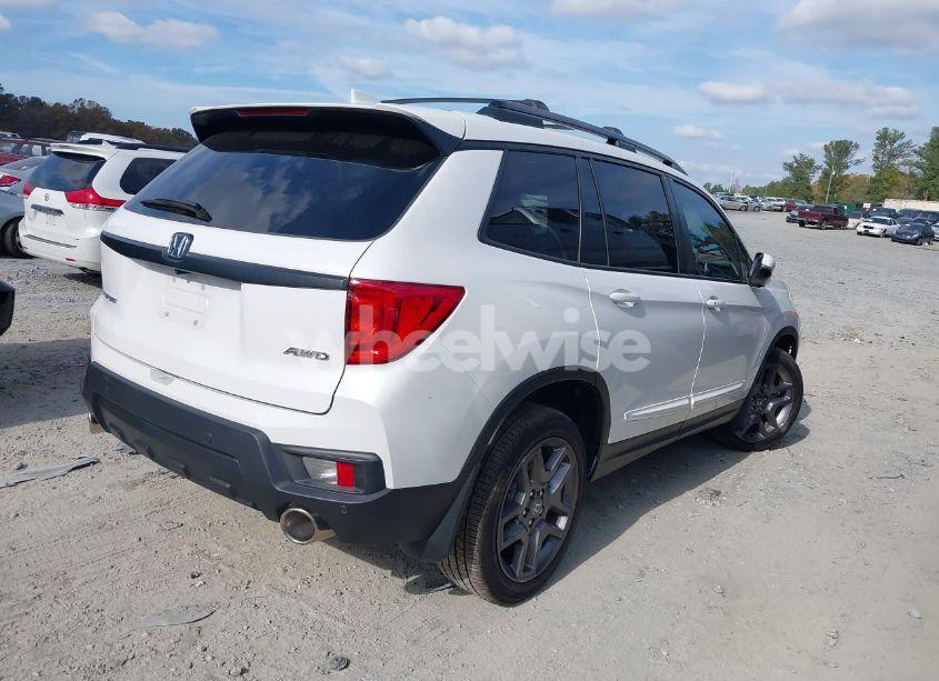 Photo 4 of 2023 Honda Passport AWD EX-L (VIN 5FNYF8H55PB024290)