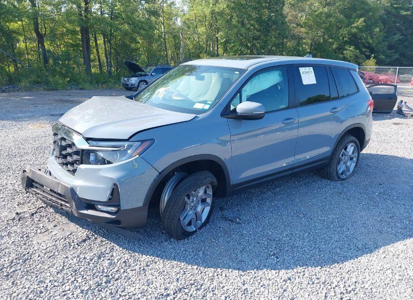 Photo 2 of 2024 Honda Passport AWD EX-L (VIN 5FNYF8H5XRB017757)