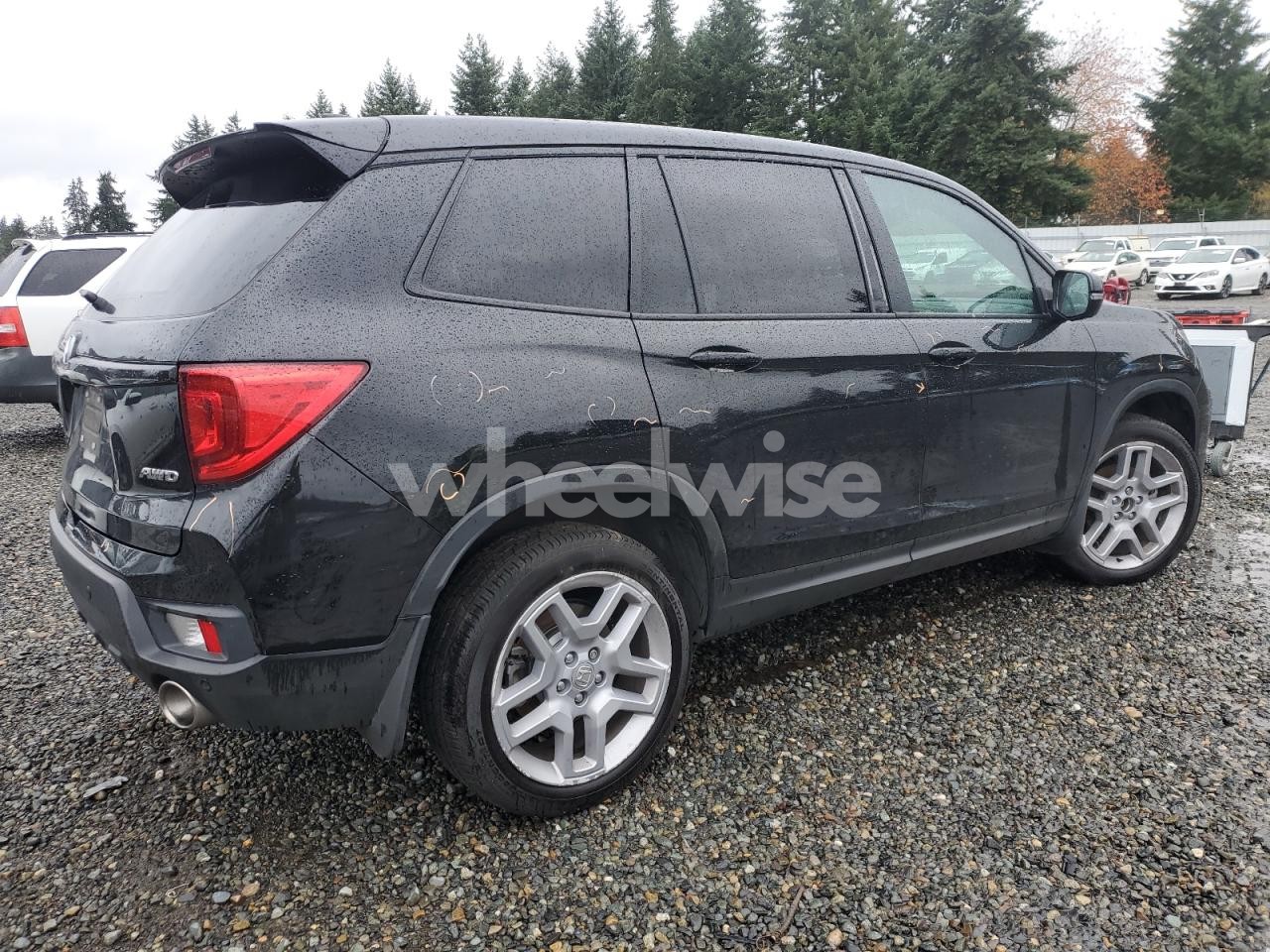 Photo 3 of 2024 HONDA PASSPORT EXL (VIN 5FNYF8H69RB012140)