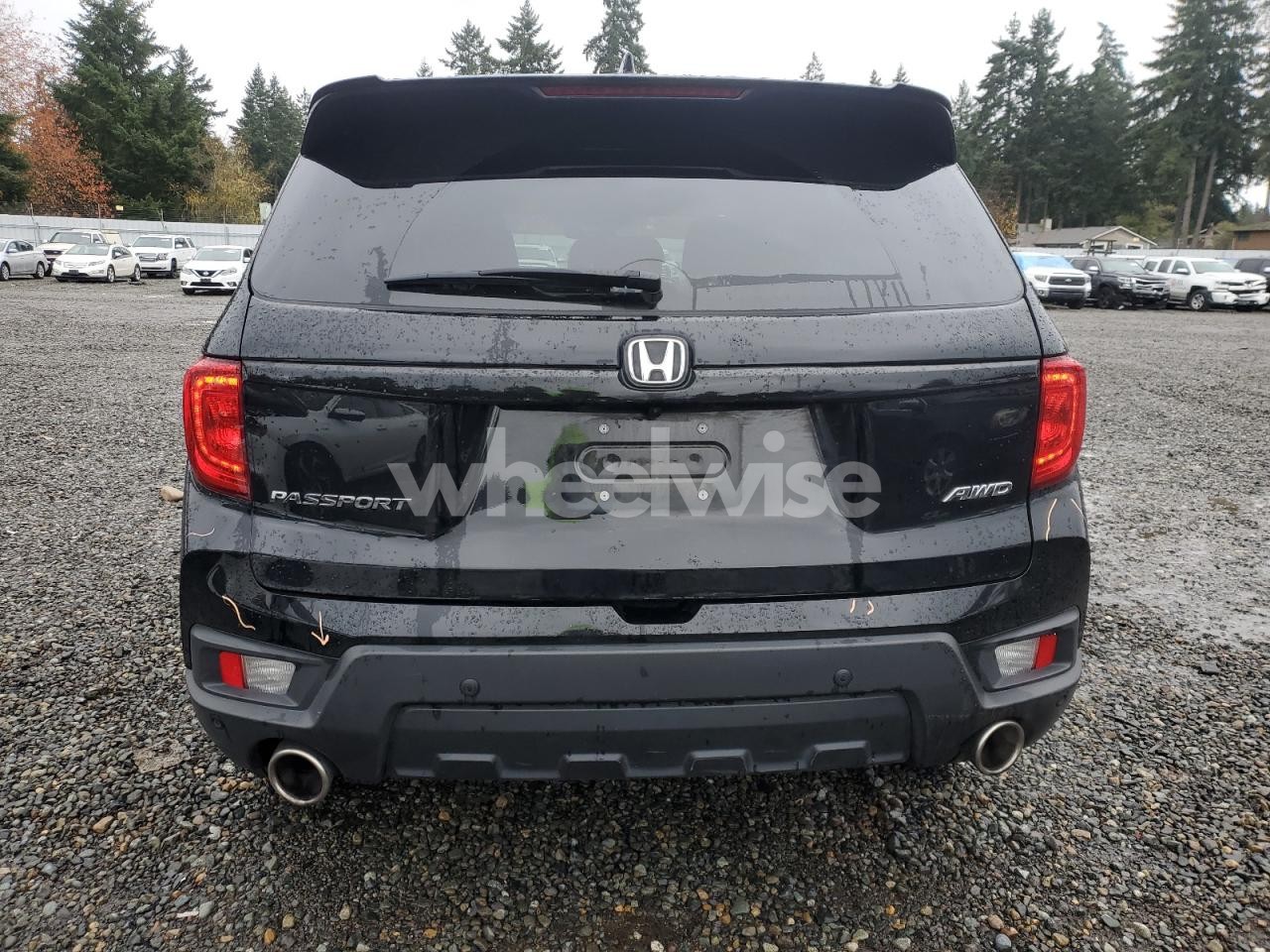 Photo 6 of 2024 HONDA PASSPORT EXL (VIN 5FNYF8H69RB012140)