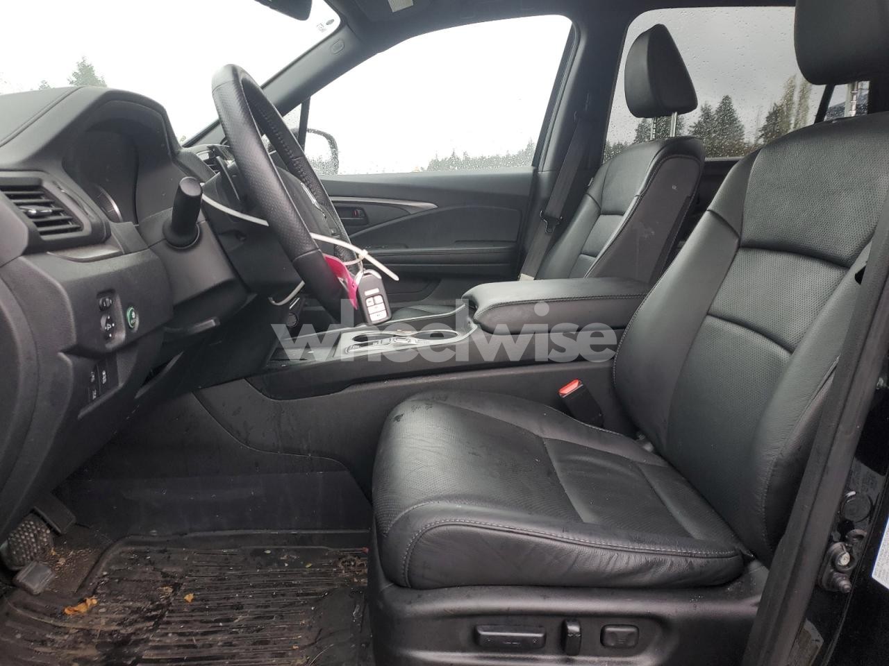 Photo 7 of 2024 HONDA PASSPORT EXL (VIN 5FNYF8H69RB012140)