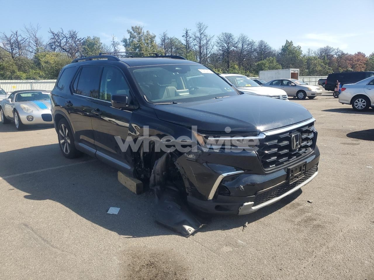 Photo 4 of 2023 HONDA PILOT TOURING (VIN 5FNYG1H78PB051750)