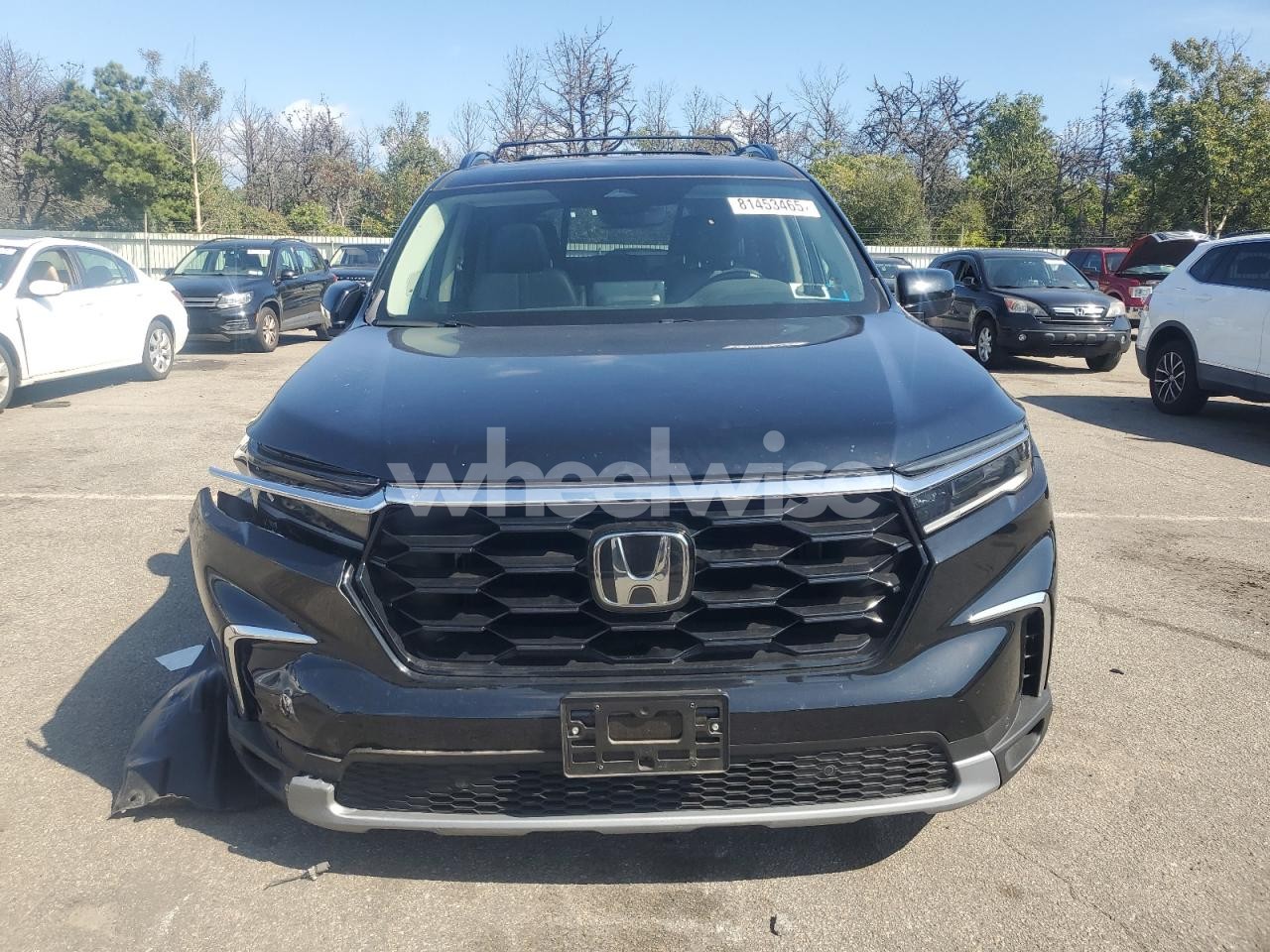Photo 5 of 2023 HONDA PILOT TOURING (VIN 5FNYG1H78PB051750)
