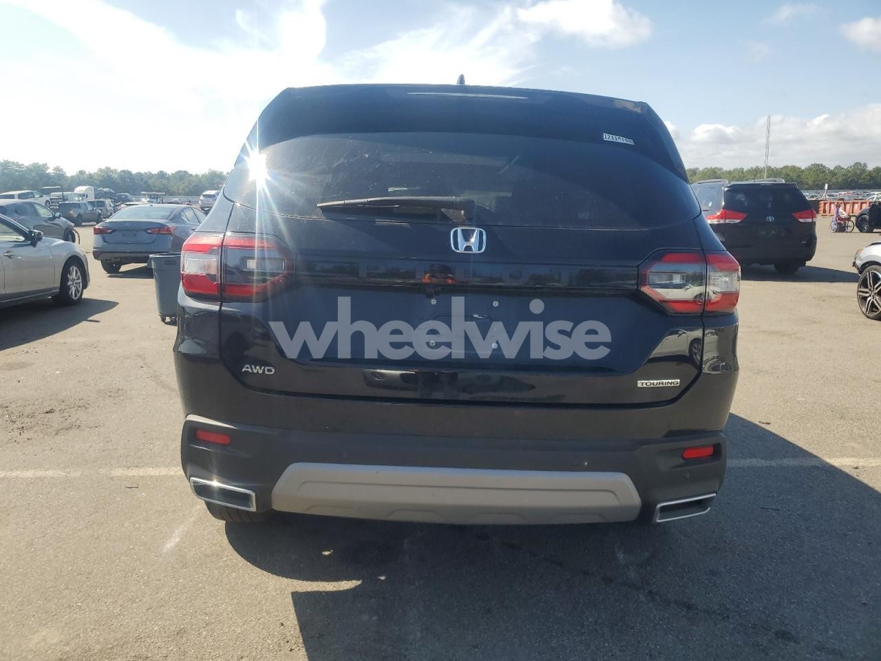 Photo 6 of 2023 HONDA PILOT TOURING (VIN 5FNYG1H78PB051750)