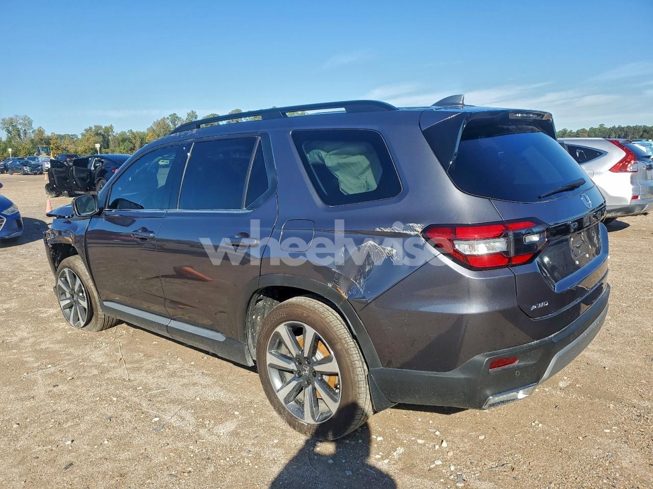 Photo 2 of 2025 HONDA PILOT ELITE (VIN 5FNYG1H89SB117921)