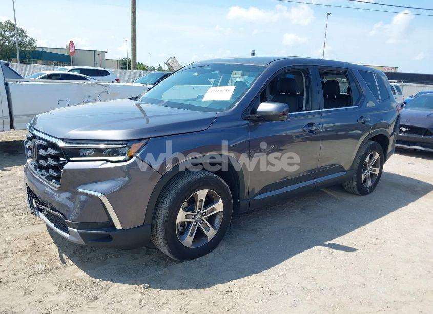 Photo 2 of 2024 Honda Pilot EX-L 7 PASSENGER (VIN 5FNYG2H5XRB001827)