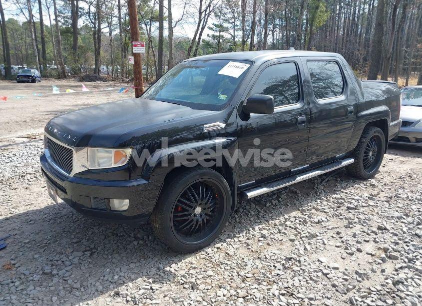 Photo 2 of 2011 Honda Ridgeline RT (VIN 5FPYK1F20BB002726)