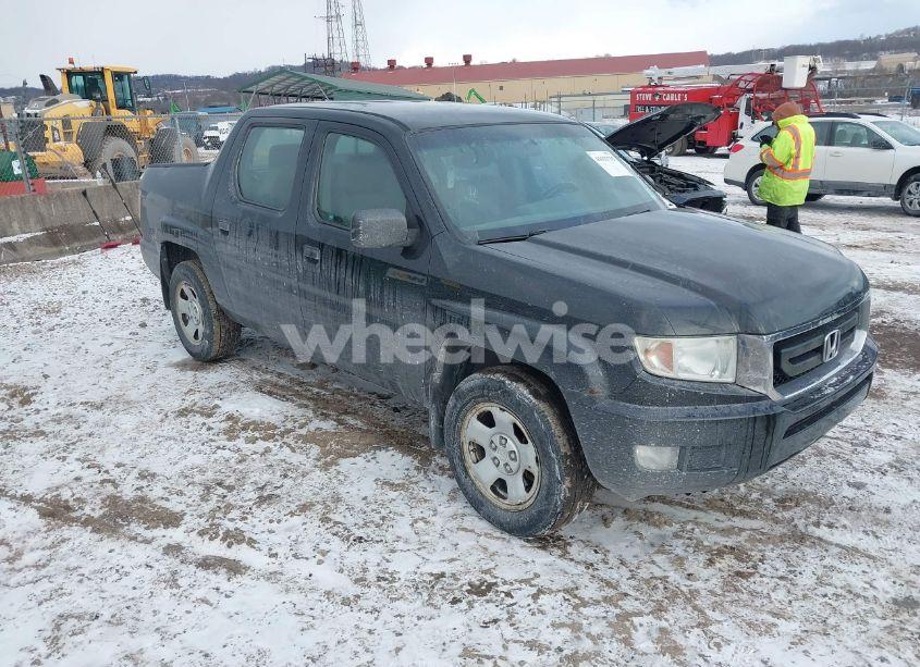 2011 Honda Ridgeline RT (VIN 5FPYK1F28BB451863) main photo