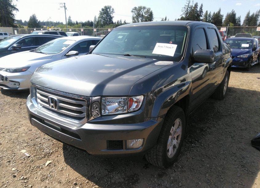 Photo 2 of 2012 Honda Ridgeline RTS (VIN 5FPYK1F49CB457609)