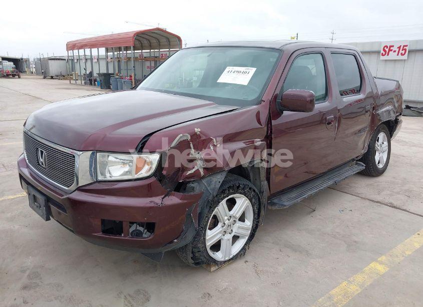 Photo 2 of 2014 Honda Ridgeline RTL (VIN 5FPYK1F52EB010700)