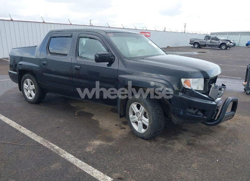 2011 Honda Ridgeline RTL (VIN 5FPYK1F53BB001385) main photo