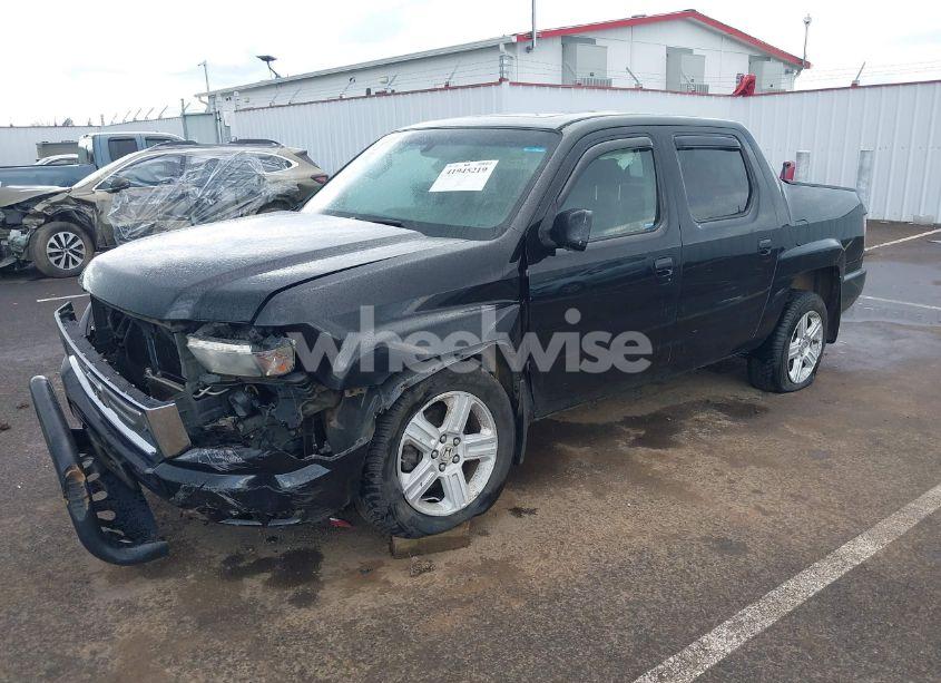 Photo 2 of 2011 Honda Ridgeline RTL (VIN 5FPYK1F53BB001385)