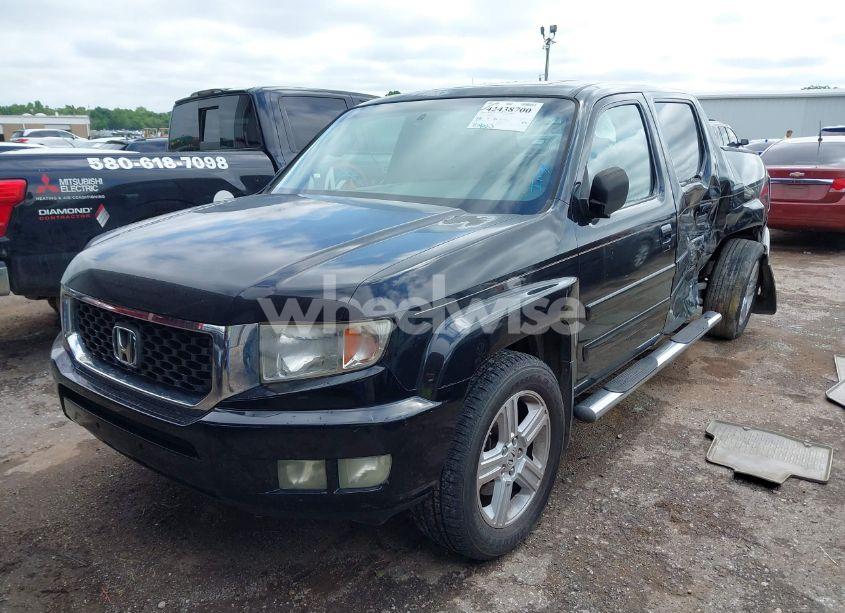 Photo 2 of 2010 Honda Ridgeline RTL (VIN 5FPYK1F54AB008375)