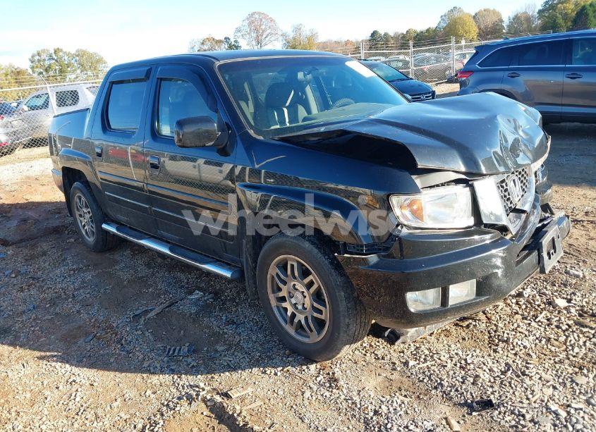 2011 Honda Ridgeline RTL (VIN 5FPYK1F54BB010113) main photo