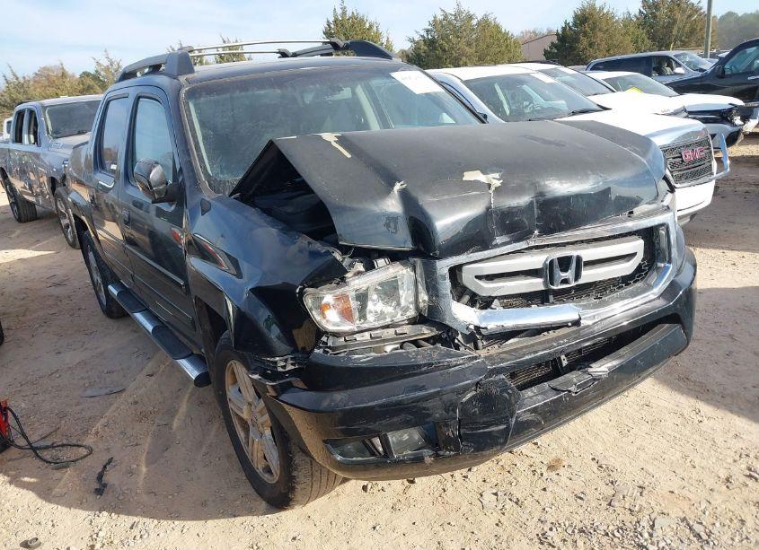 2011 Honda Ridgeline RTL (VIN 5FPYK1F57BB003253) main photo
