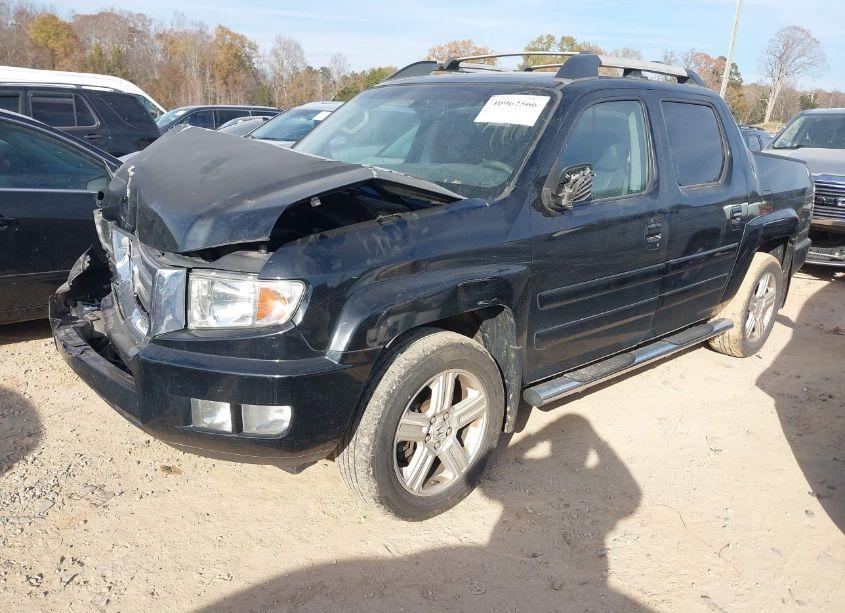 Photo 2 of 2011 Honda Ridgeline RTL (VIN 5FPYK1F57BB003253)