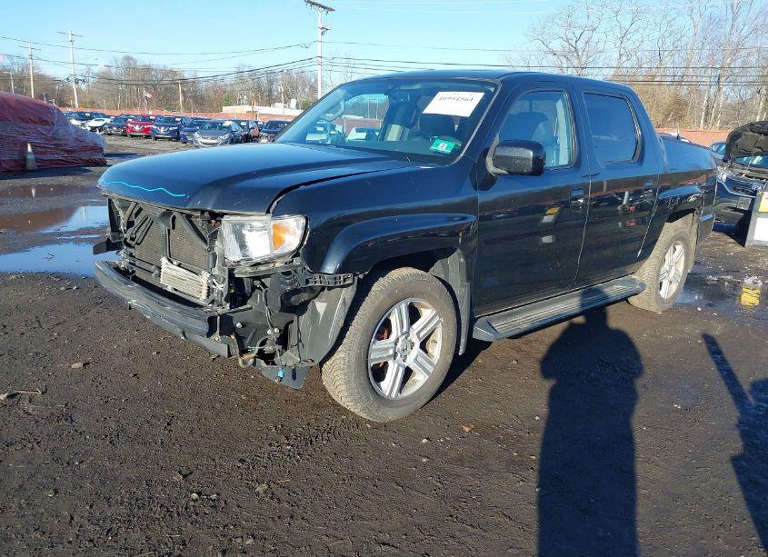Photo 2 of 2014 Honda Ridgeline RTL (VIN 5FPYK1F57EB002205)