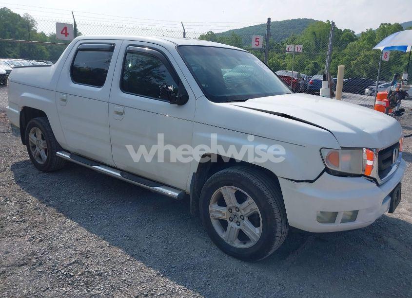 2010 Honda Ridgeline RTL (VIN 5FPYK1F58AB012526) main photo