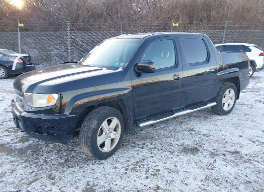 Photo 2 of 2011 Honda Ridgeline RTL (VIN 5FPYK1F58BB001320)
