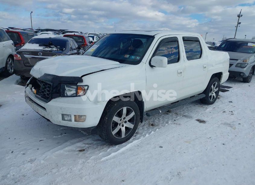Photo 2 of 2014 Honda Ridgeline SE (VIN 5FPYK1F6XEB007553)
