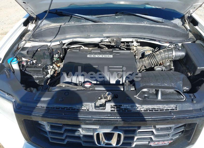 Photo 10 of 2012 Honda Ridgeline SPORT (VIN 5FPYK1F77CB454024)