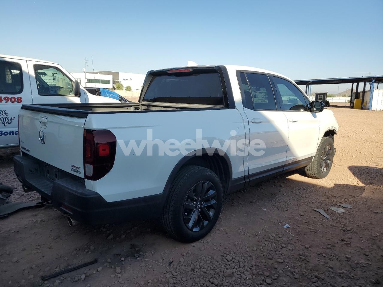Photo 3 of 2021 HONDA RIDGELINE SPORT (VIN 5FPYK3F10MB002201)