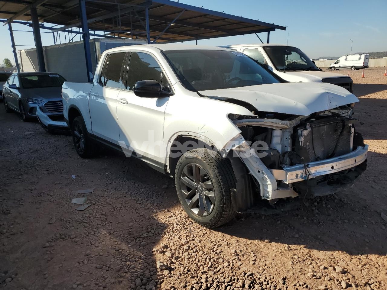 Photo 4 of 2021 HONDA RIDGELINE SPORT (VIN 5FPYK3F10MB002201)