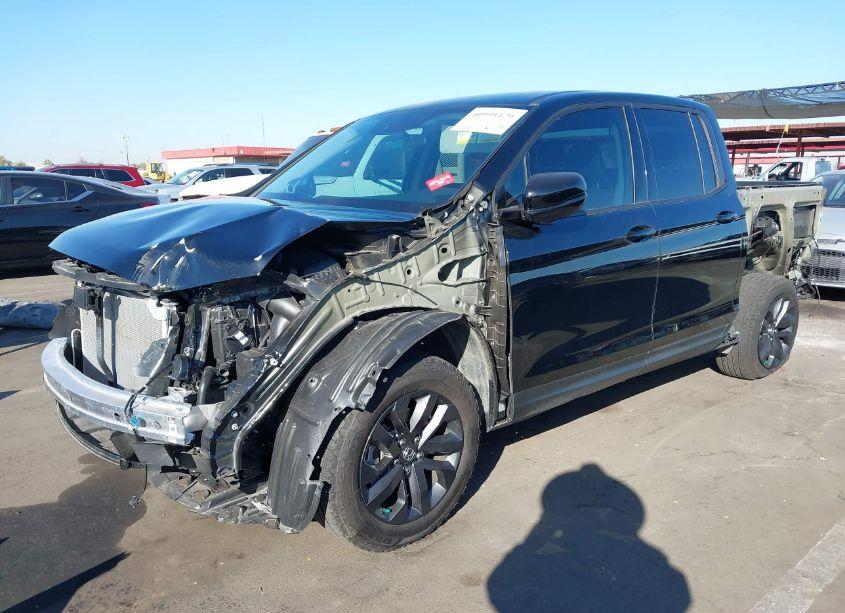 Photo 2 of 2024 Honda Ridgeline SPORT (VIN 5FPYK3F10RB000357)