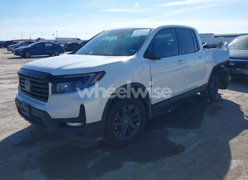 Photo 2 of 2023 Honda Ridgeline SPORT (VIN 5FPYK3F14PB041099)