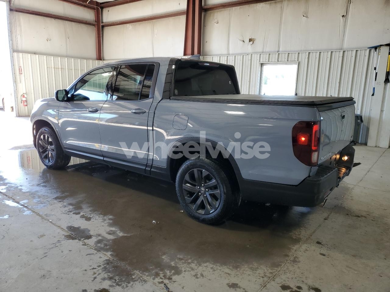 Photo 2 of 2023 HONDA RIDGELINE SPORT (VIN 5FPYK3F15PB046988)