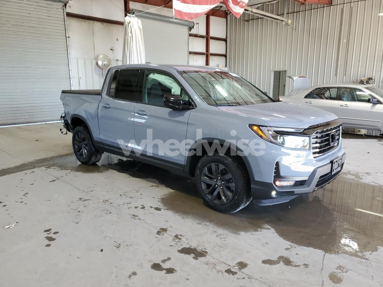 Photo 4 of 2023 HONDA RIDGELINE SPORT (VIN 5FPYK3F15PB046988)