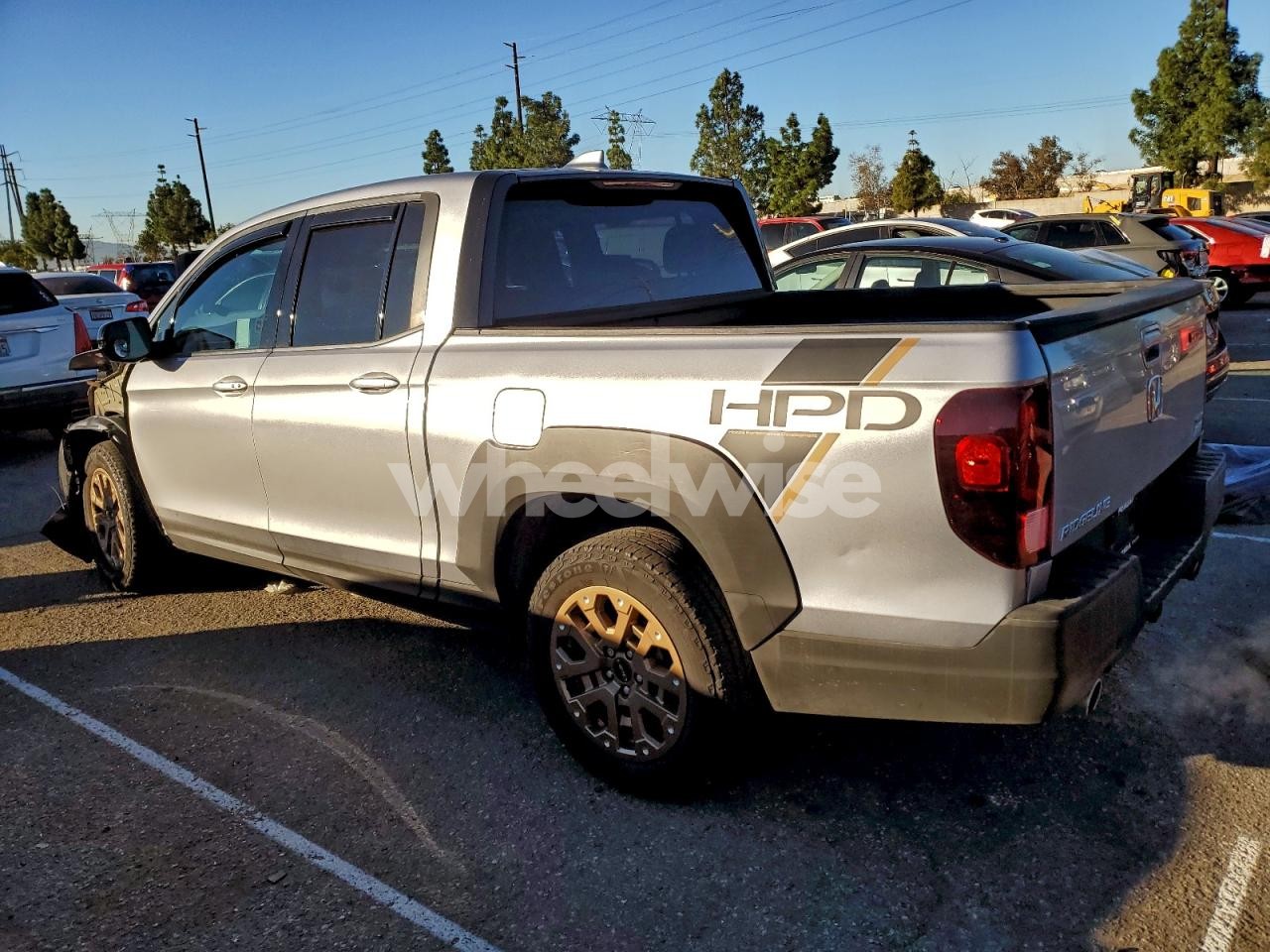 Photo 2 of 2021 HONDA RIDGELINE SPORT (VIN 5FPYK3F16MB023604)