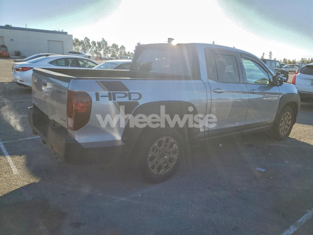 Photo 3 of 2021 HONDA RIDGELINE SPORT (VIN 5FPYK3F16MB023604)