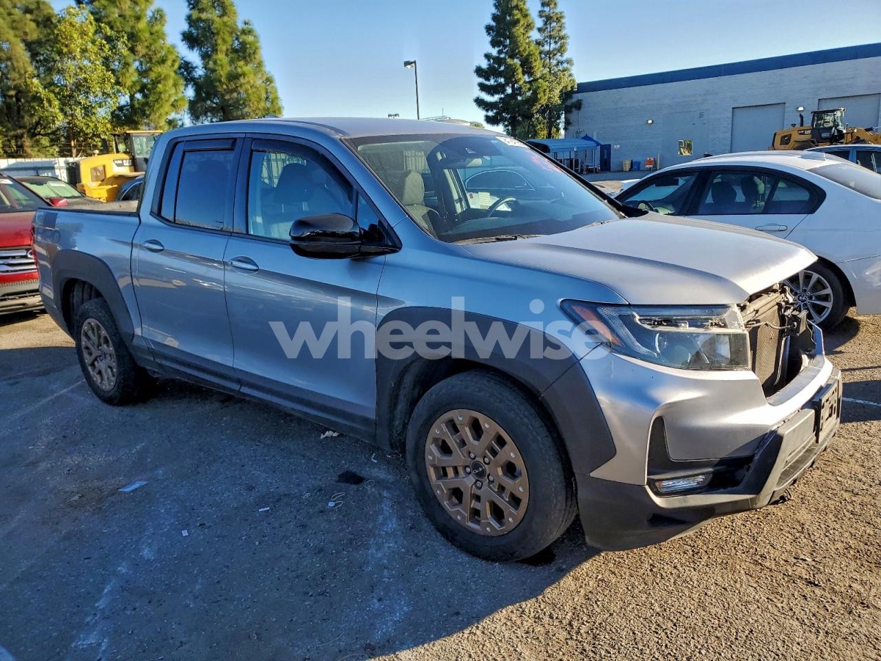 Photo 4 of 2021 HONDA RIDGELINE SPORT (VIN 5FPYK3F16MB023604)