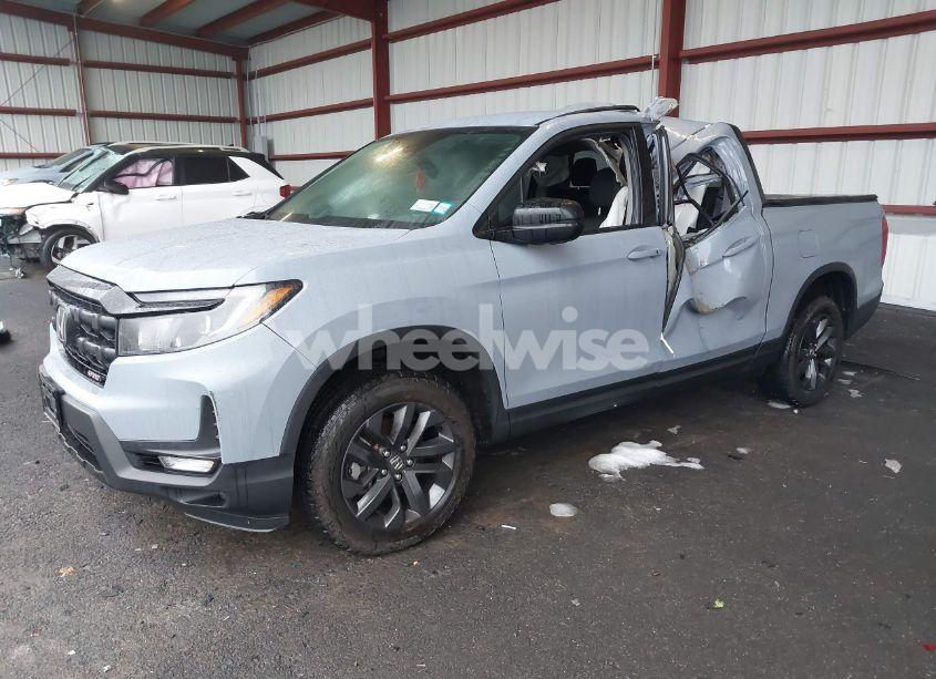 Photo 2 of 2024 Honda Ridgeline SPORT (VIN 5FPYK3F18RB008206)