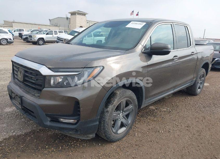 Photo 2 of 2023 Honda Ridgeline RTL (VIN 5FPYK3F59PB004388)