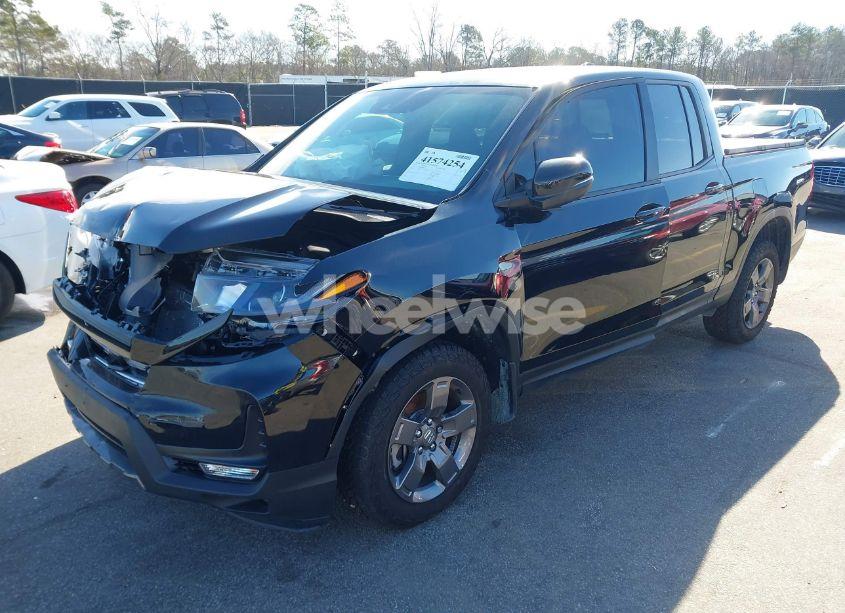 Photo 2 of 2024 Honda Ridgeline TRAILSPORT (VIN 5FPYK3F62RB004549)