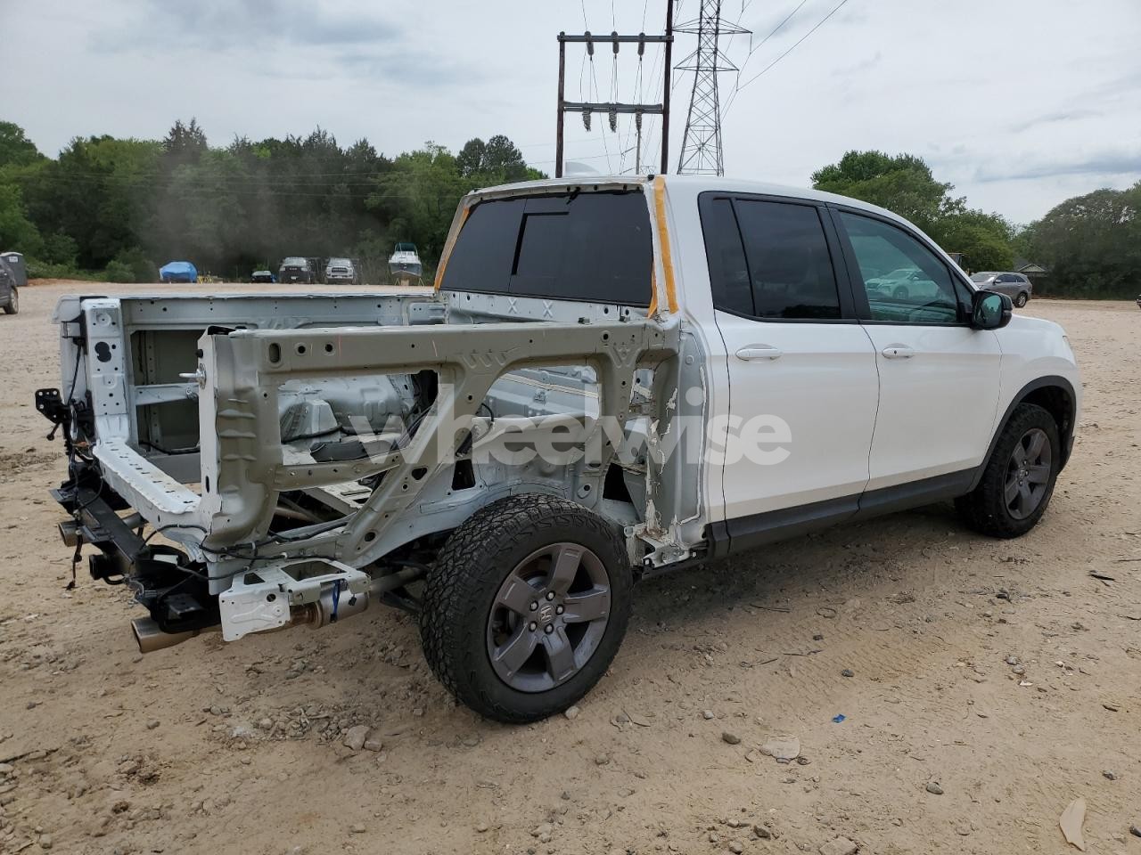 Photo 3 of 2024 HONDA RIDGELINE TRAIL SPORT (VIN 5FPYK3F6XRB008865)