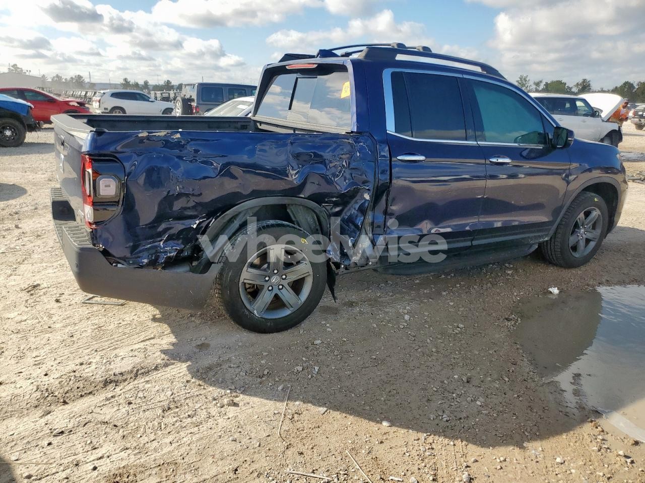 Photo 3 of 2023 HONDA RIDGELINE RTL-E (VIN 5FPYK3F79PB025744)