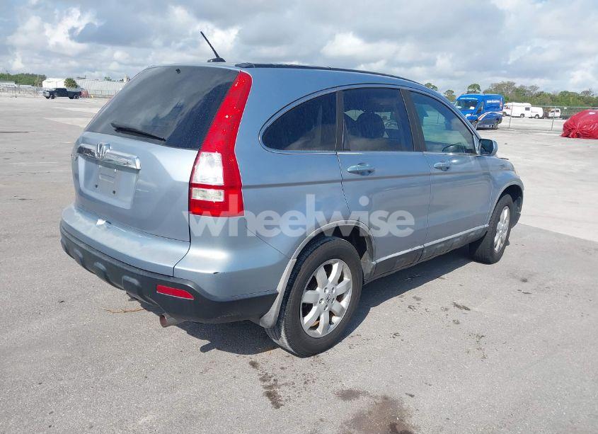 Photo 4 of 2009 Honda Cr-v EX-L (VIN 5J6RE38759L001971)